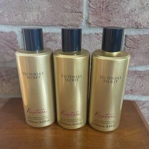 Victoria's Secret Rapture Mist, set of 3. Brand new. Size: 8.4 oz Hard to find!